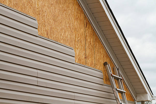 Professional Emergency Siding Repair technician working in Niles, IL
